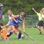 SHOT HEADED FOR THE NET â€” Fryeburg Academyâ€™s Sage Hennessy (right) fires a drive past a Laker defender and goalie Shannon Van Loan for a first half goal during the season opener last Friday. Fryeburg peppered the Laker net to earn a 5-1 victory. (Rivet Photo)